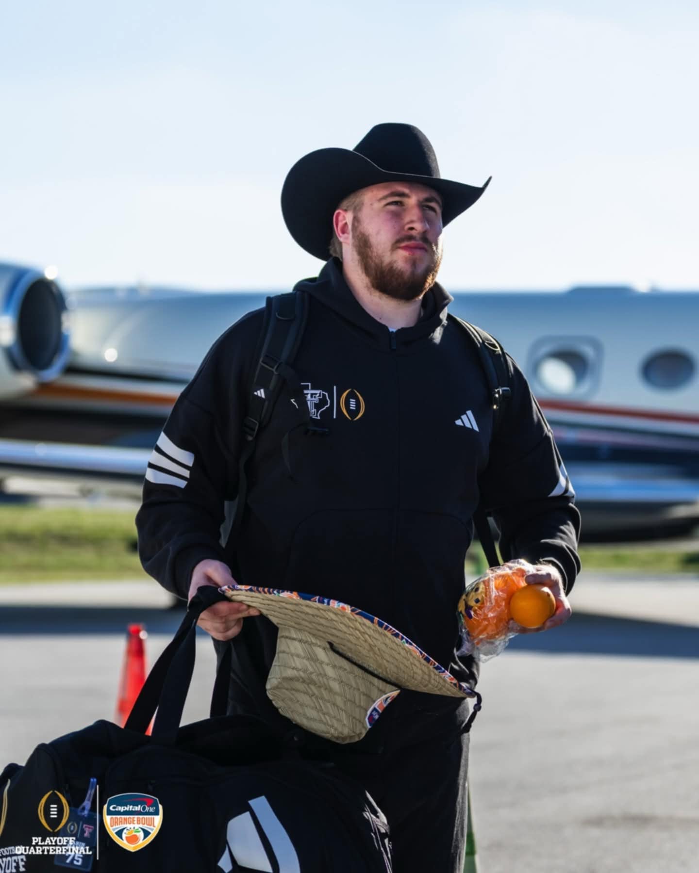 Custom tropical straw hats crafted for the 2026 Capital One Orange Bowl arrival experience