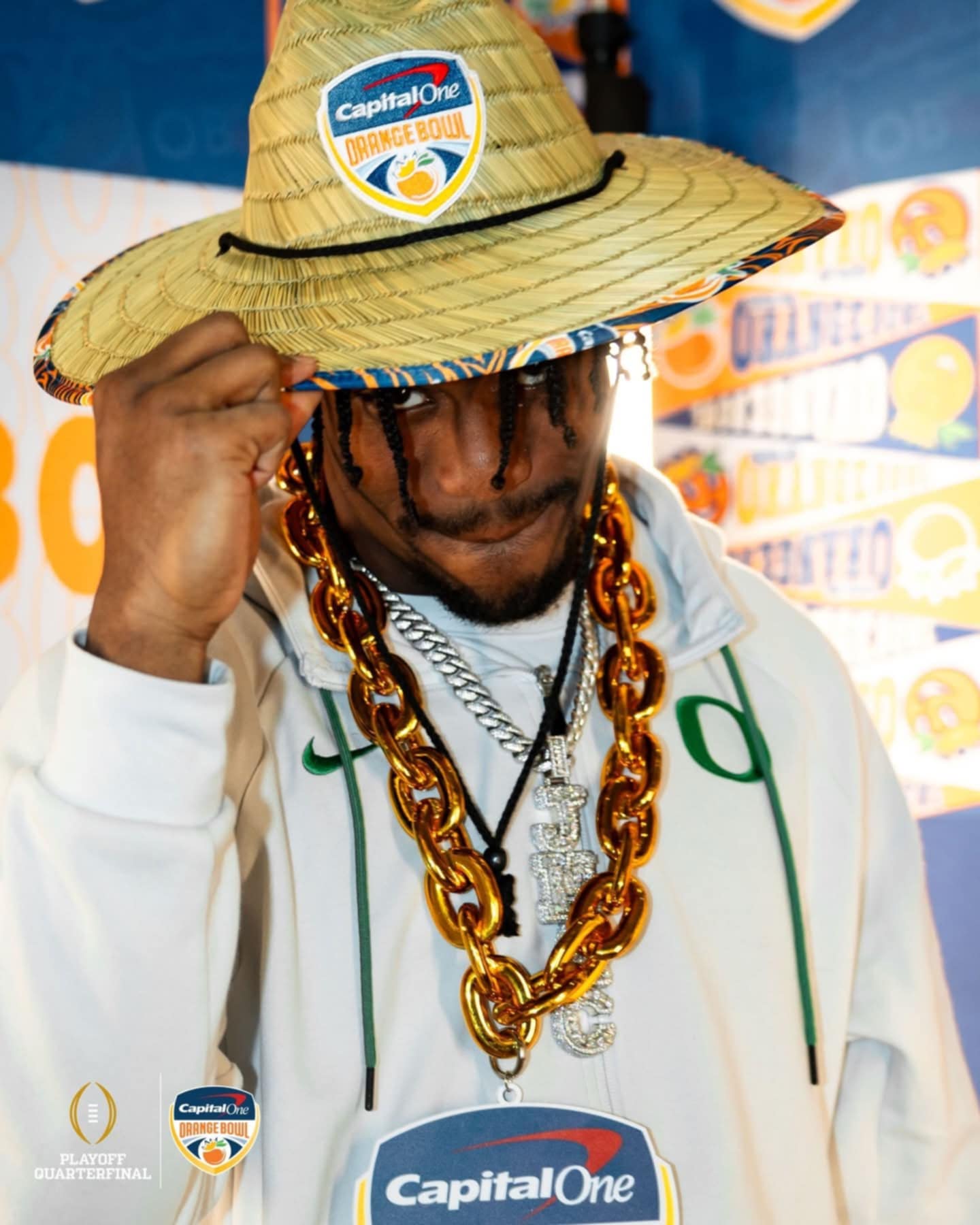 Tropical-inspired custom straw hats created for team arrivals at the 2026 Capital One Orange Bowl